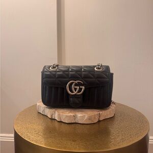 Gucci Black Marmont Quilted Shoulder Bag with Silver Logo.